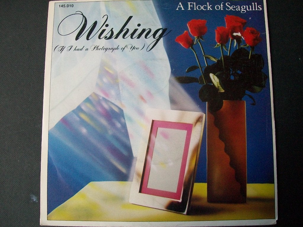 Flock of Seagulls (7-inch) met Wishing (1982) in nieuwstaat, 7 inch, Zo goed als nieuw, Pop, Beschermende buitenhoes