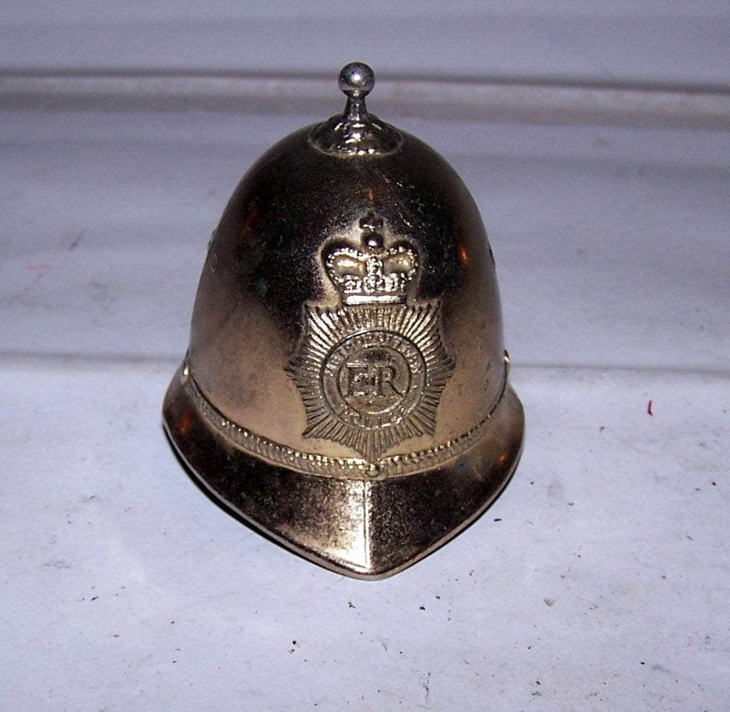 Tafelbelletje Helm ER Metroplitan Police. Nwst., Ophalen of Verzenden