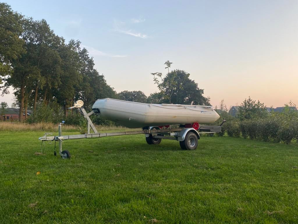 Buitenboordmotor met bootje en trailer, Ophalen, Gebruikt