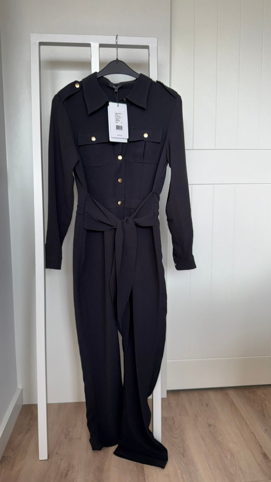 Nikkie Jumpsuit Maat 42 - Nieuw met kaartjes!, Kleding | Dames, Ophalen of Verzenden, Nieuw, Maat 42/44 (L), Zwart