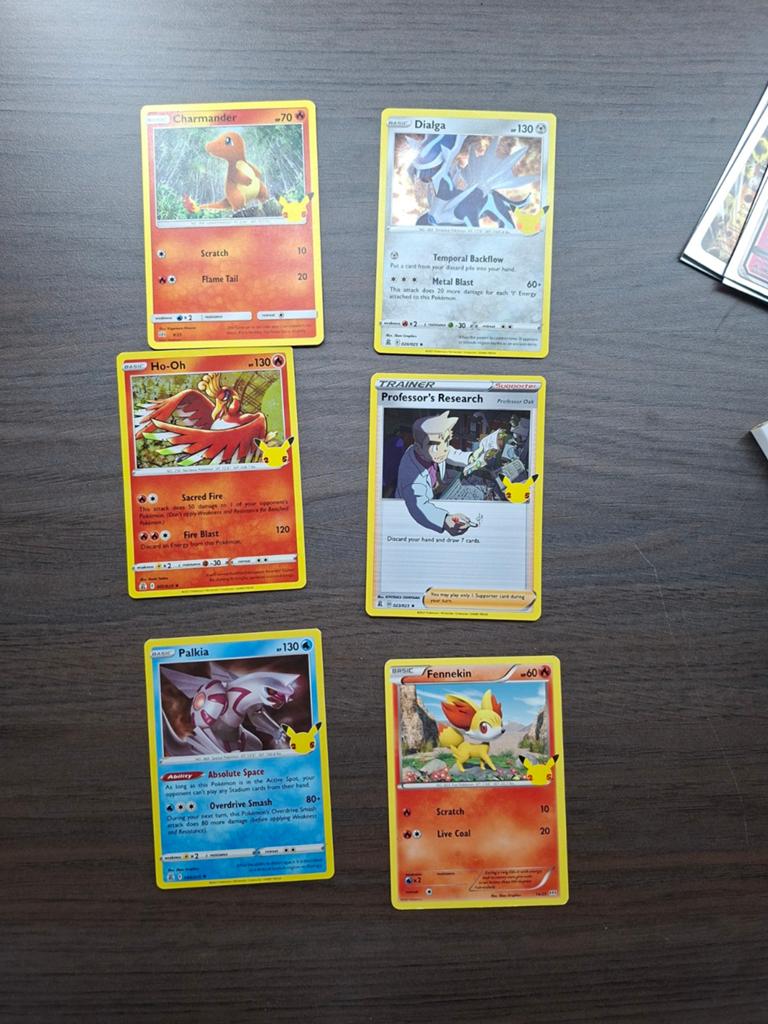 Pokémon Celebrations Kaarten: Charmander, Ho-Oh, Palkia, Dia, Ophalen of Verzenden, Zo goed als nieuw, Meerdere kaarten