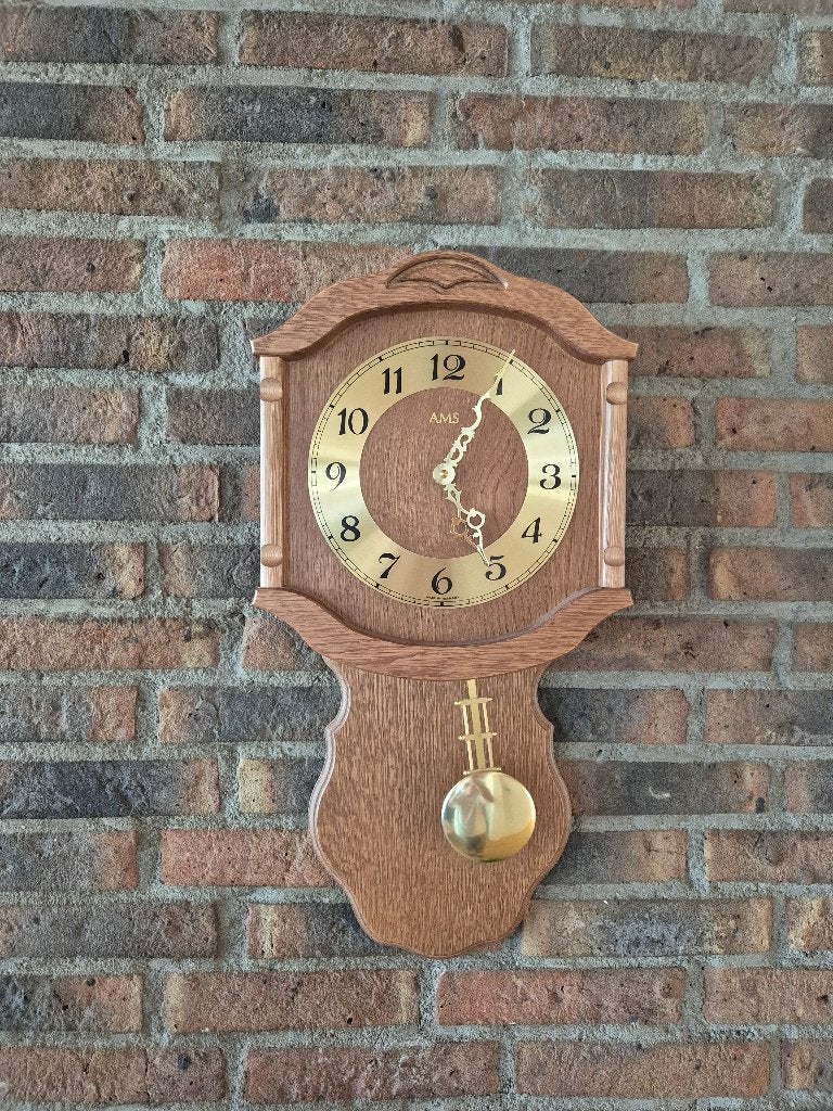 AMS eikenhouten slingerklok, Ophalen