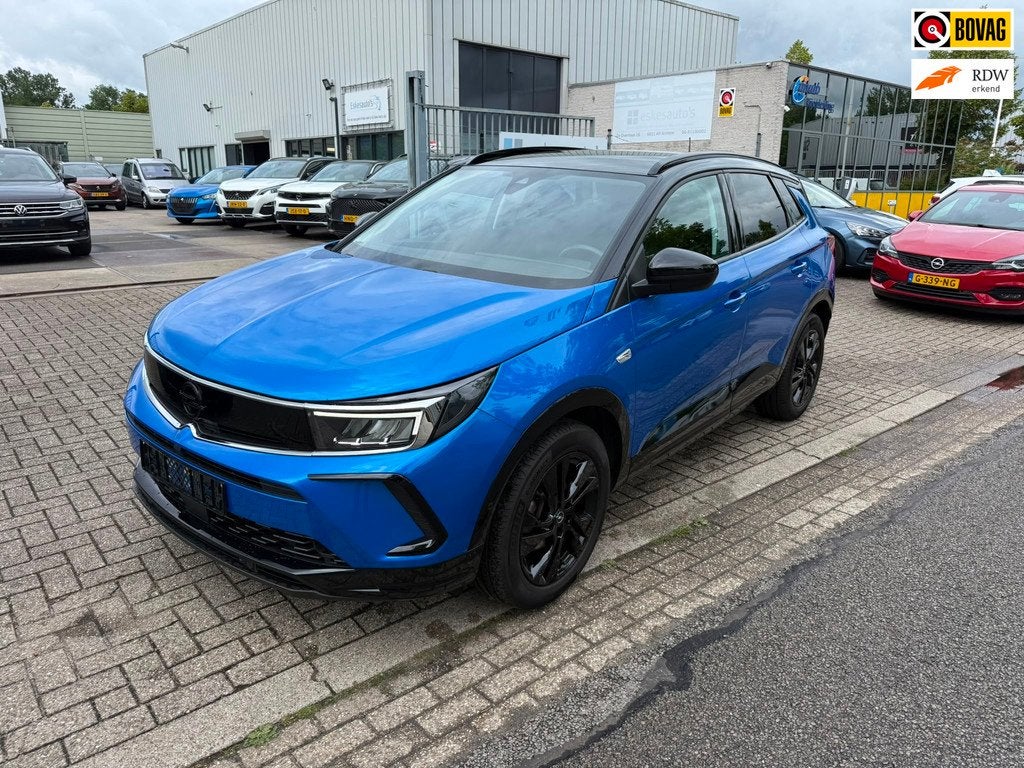 Opel Grandland 1.2 Turbo GS Automaat, Navi, Nieuwstaat Deale, Auto's, Gebruikt, 1199 cc, Blauw, Leder en Stof