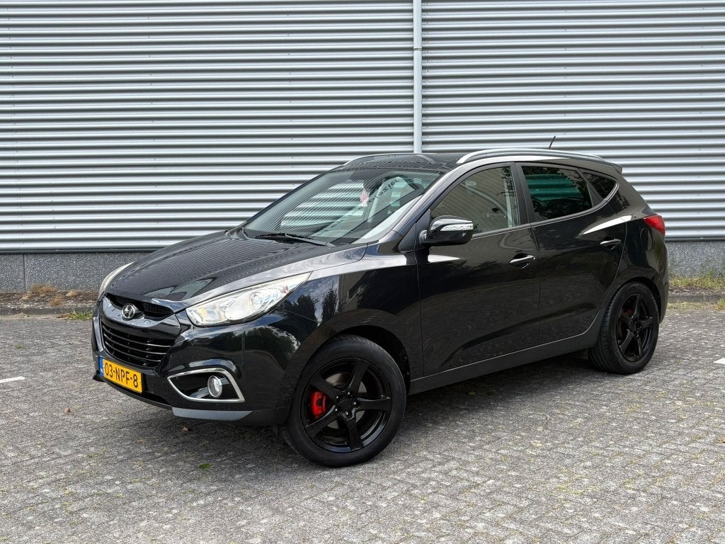 Hyundai ix35 2.0i 4WD i-Catcher PANO STOELVW LEDER, 13 km/l, Gebruikt, Zwart, 4 cilinders