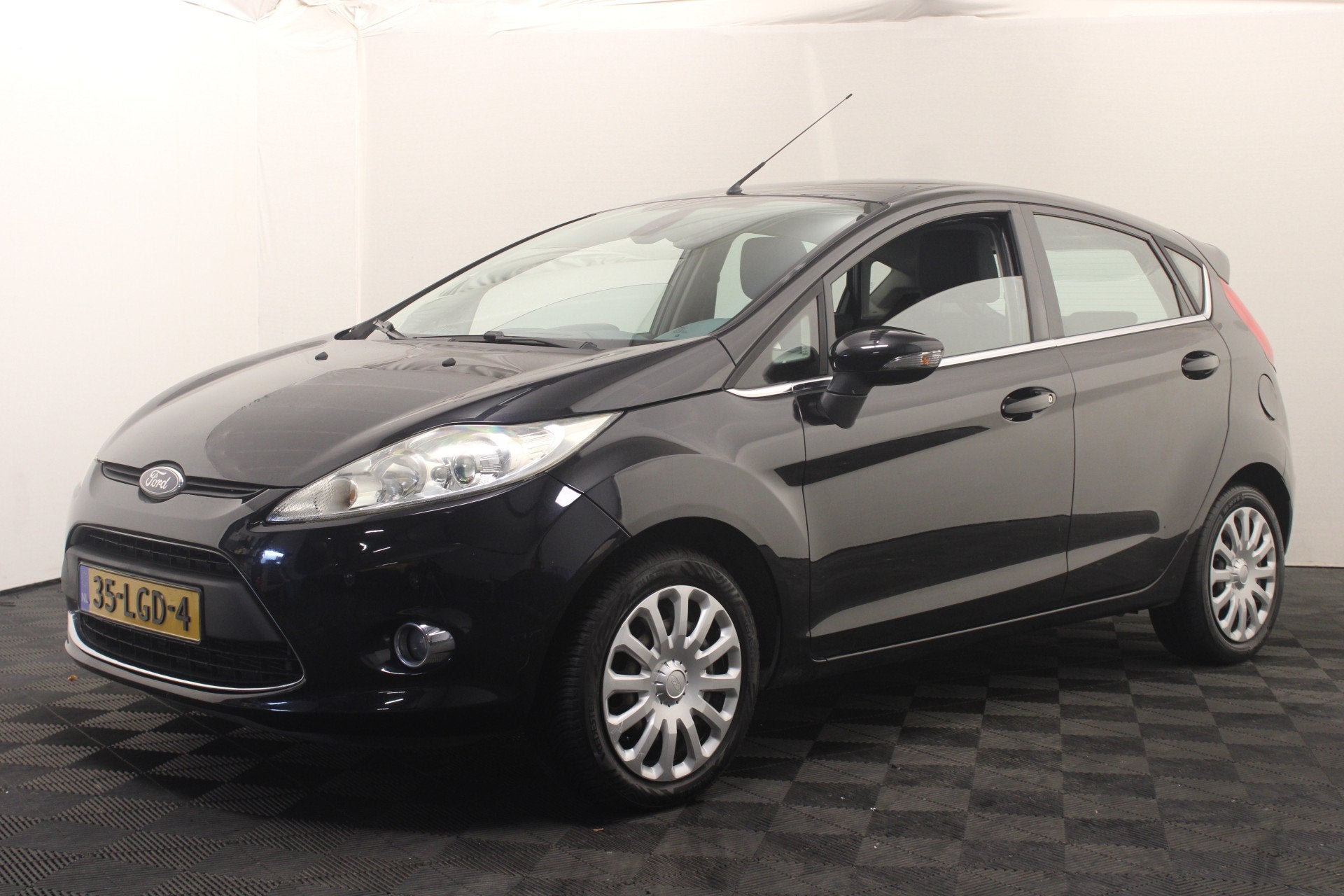 Ford Fiesta 1.25 Titanium (bj 2010), Auto's, Voorwielaandrijving, Euro 5, Stof, 82 pk