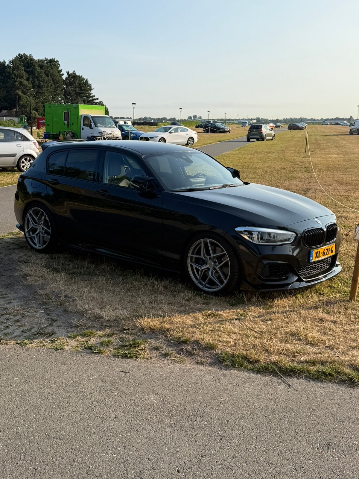 BMW 1-Serie 3.0 M135i 5DR AUT 2016 Zwart, Auto's, Achterwielaandrijving, Zwart, Zwart, Leder