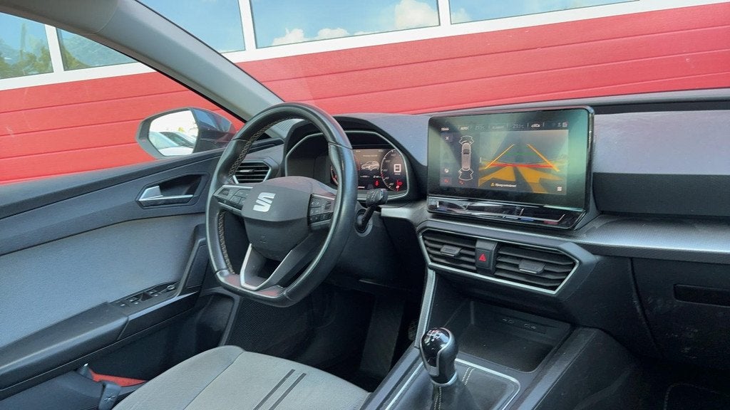 SEAT Leon Sportstourer 1.0 TSI Style Launch Edition TREKHAAK, Auto's, Stof, Gebruikt, Euro 6, Leon