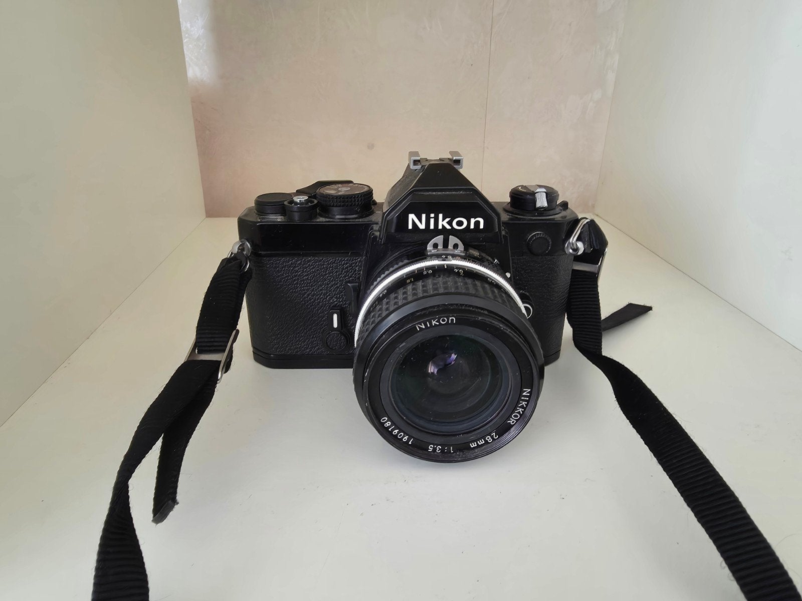 Nikon Spiegelreflexcamera met Nikkor 28mm f/3.5 lens, Audio, Tv en Foto, Fotocamera's Analoog, Ophalen of Verzenden, Gebruikt