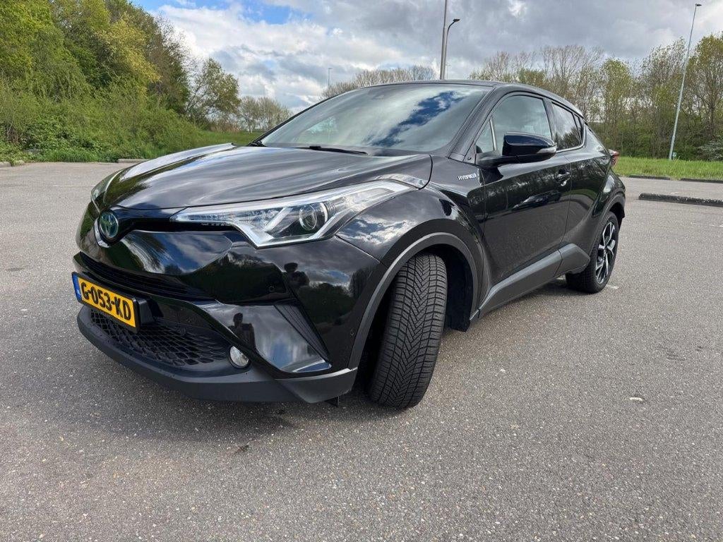 Toyota C-HR 1.8 Hybrid Team D rijk uitgerust, Auto's, 725 kg, 4 cilinders, Overige bekleding, Zwart