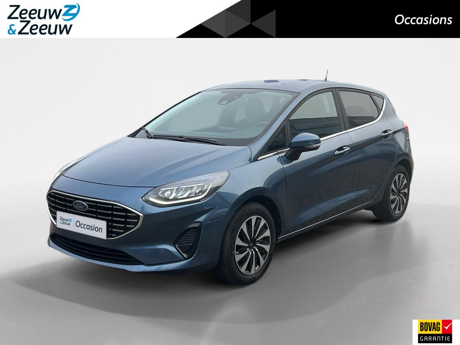 Ford Fiesta 1.0 EcoBoost Titanium 125pk | Stoel- stuur en vo, Auto's, Voorwielaandrijving, 12 maanden, Gebruikt, Blauw