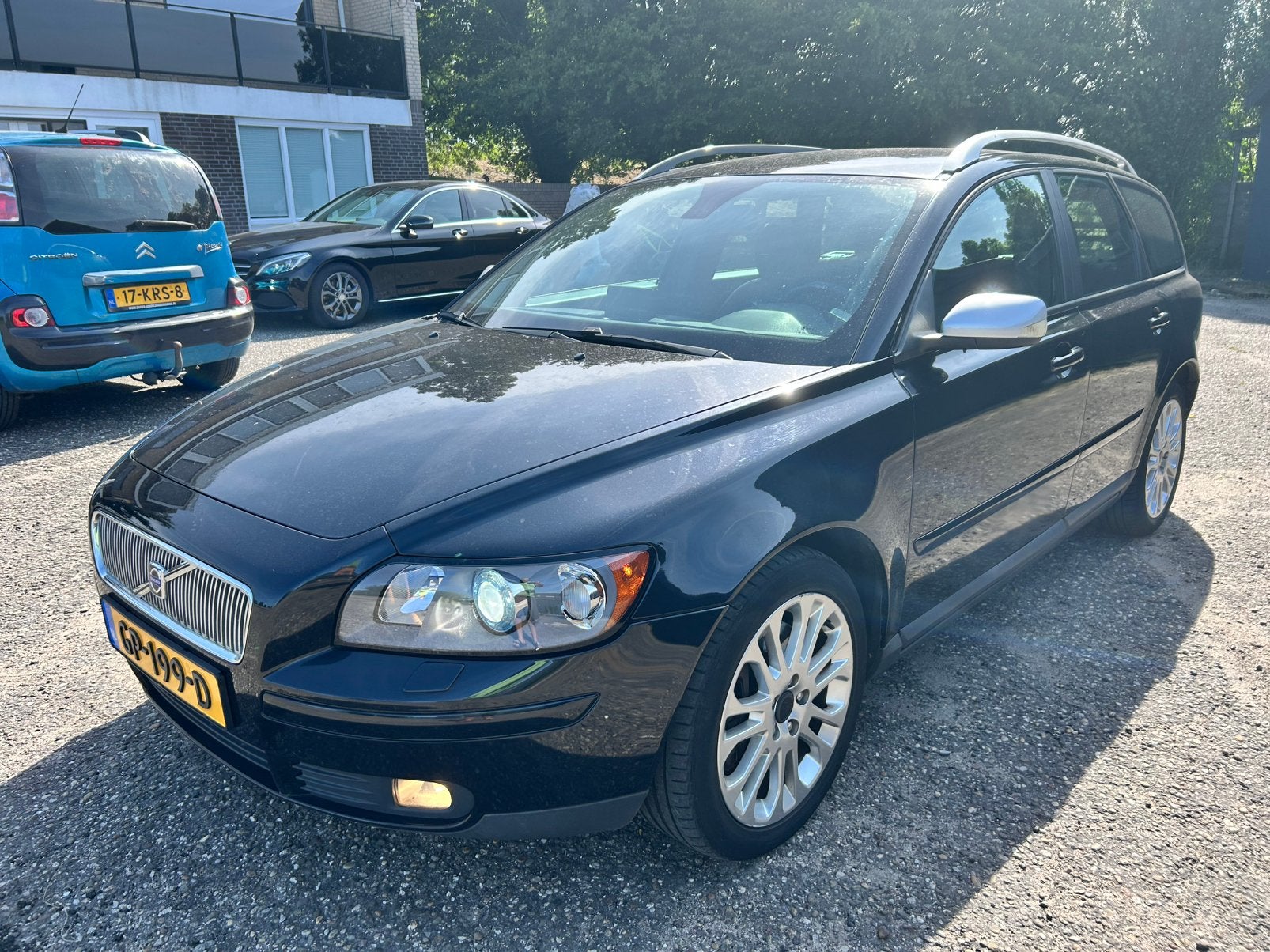 V50 2.5 T5 Momentum Leder Bi-Xenon Navi Stoel verw Trehaak, Auto's, Volvo, Voorwielaandrijving, Zwart, 700 kg, Automatische klimaatregeling