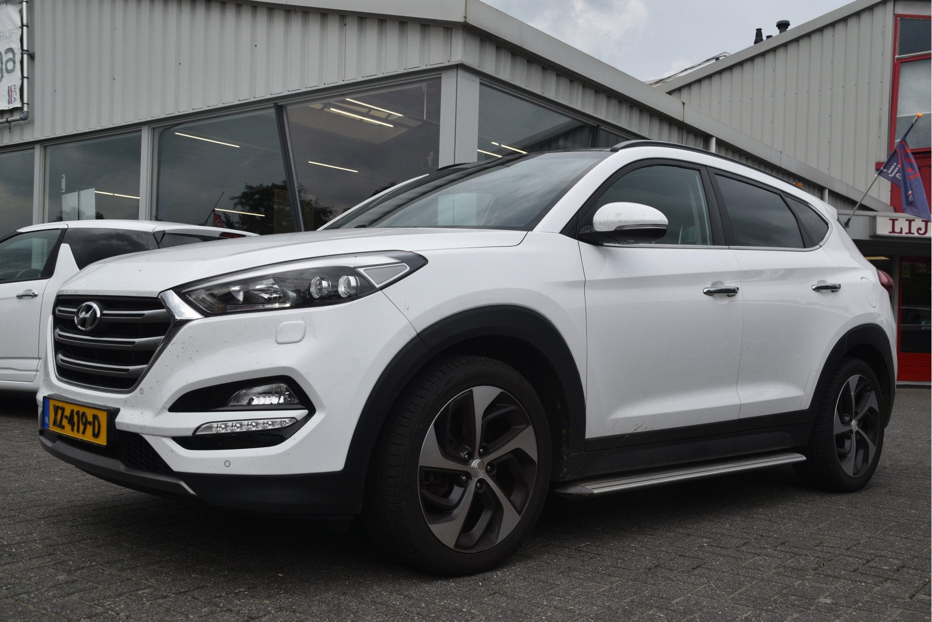 Hyundai Tucson 1.6 T-GDi Premium LED | Stuur/stoelverw. | Le, Voorwielaandrijving, 4 cilinders, Met garantie (alle), Wit