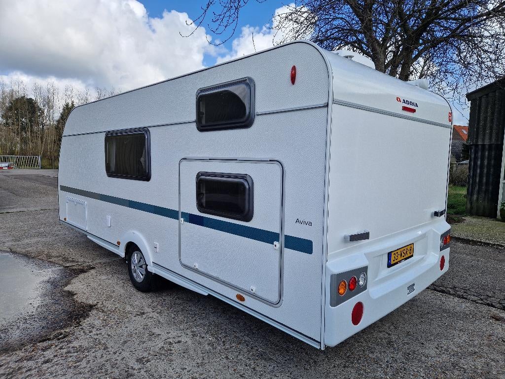Adria Aviva 563 PT, 6p Stapelbed Mover Airco Luifel 24750 !, Caravans en Kamperen, Caravans, Standaardzit, Schokbreker, Calandstraat 17 - 3316 EA Dordrecht