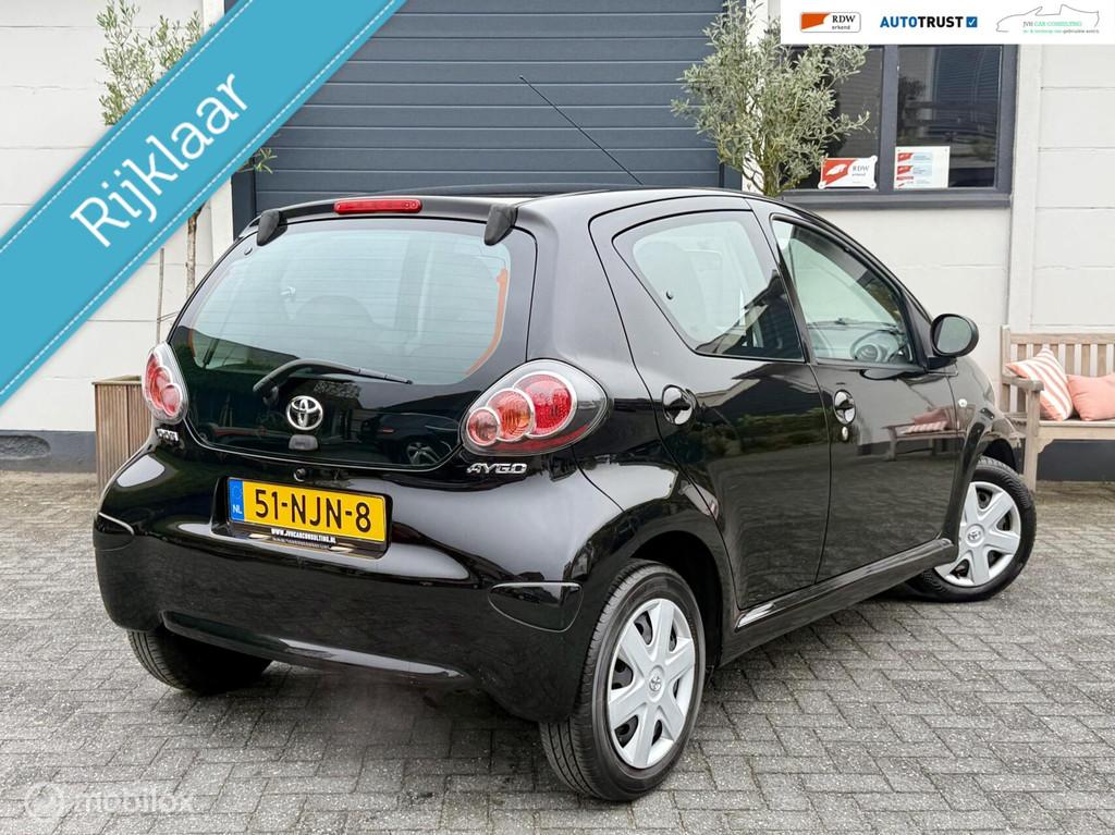 Toyota Aygo 1.0-12V AUTOMAAT|RIJKLAAR|HANDGAS|CRUISE|A-C|NAP, Auto's, Euro 5, Stof, Gebruikt, 4 stoelen