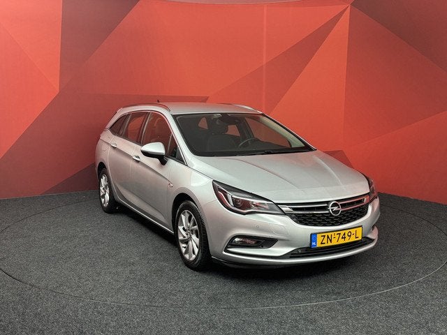Opel Astra Sports Tourer 1.4 Turbo Business Executive, Auto's, Opel, Gebruikt, 150 pk, Leder en Stof, Origineel Nederlands