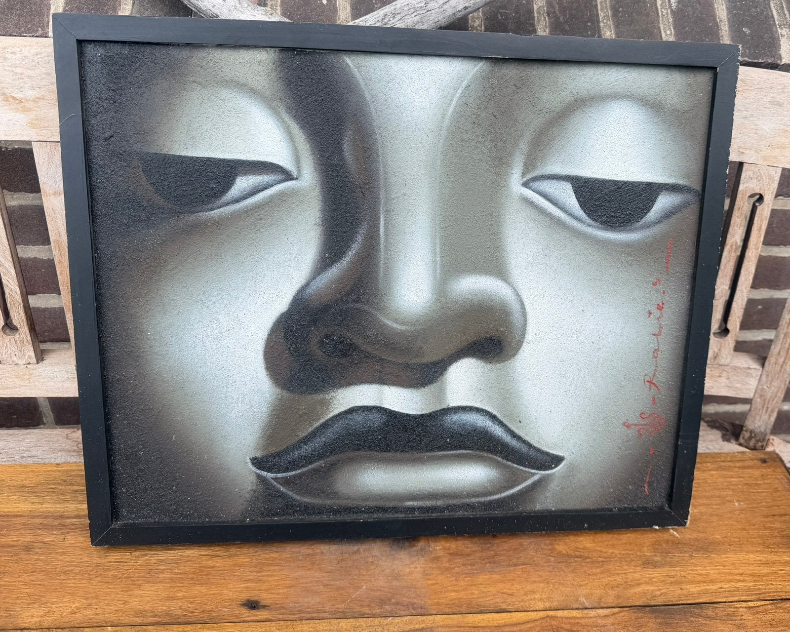 Boeddha schilderij in zwart-wit, Ophalen