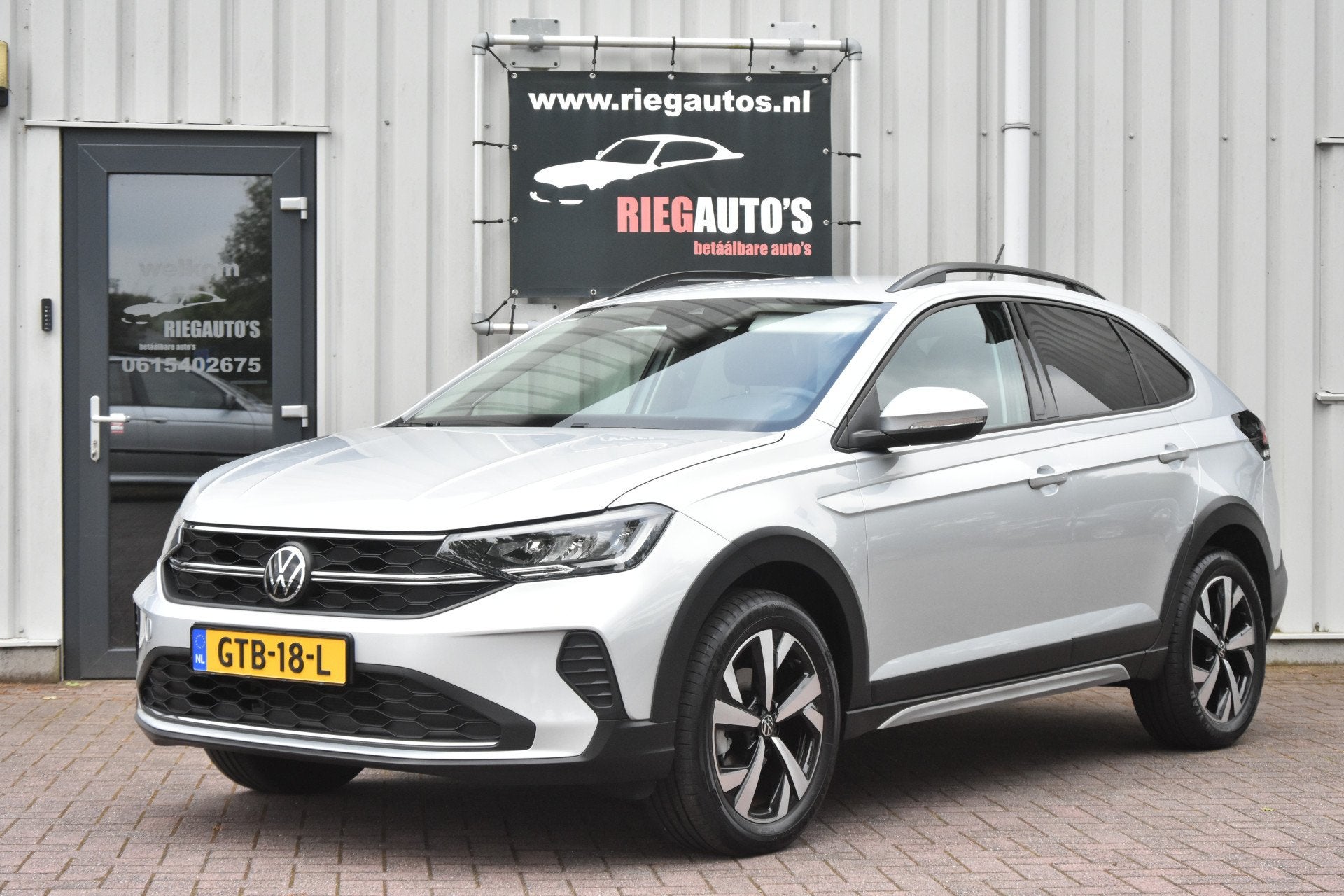 Volkswagen Taigo 1.0 TSI Oranje Edition. Origineel Nederland, Auto's, Voorwielaandrijving, Stof, Gebruikt, Euro 6