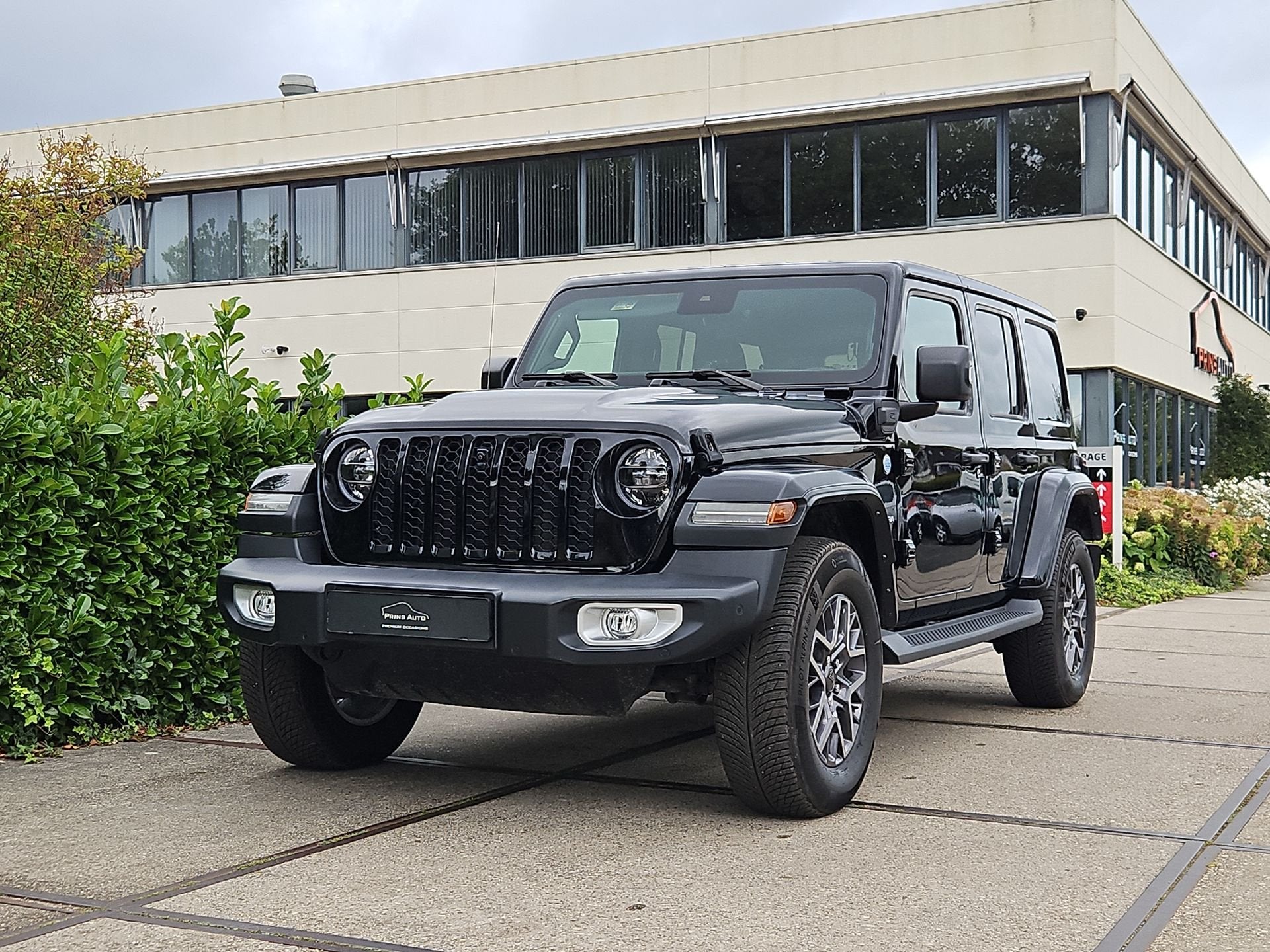 Jeep Wrangler Unlimited 4xe 380 Sahara |NAVI|CLIMA|CRUISE|CA, Adaptive Cruise Control, Zwart, 4 cilinders, Cabriolet
