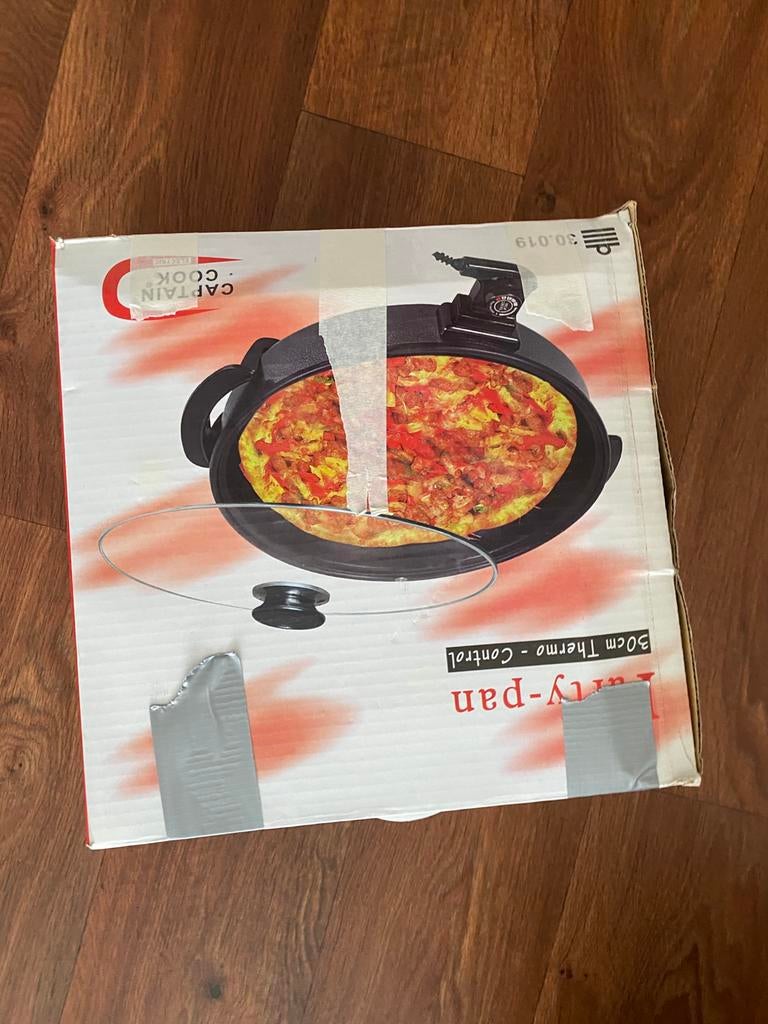 Nieuw in doos Elektrisch pizza pan, Witgoed en Apparatuur, Gourmetstellen, Ophalen of Verzenden, Zo goed als nieuw, 4 t/m 7 personen