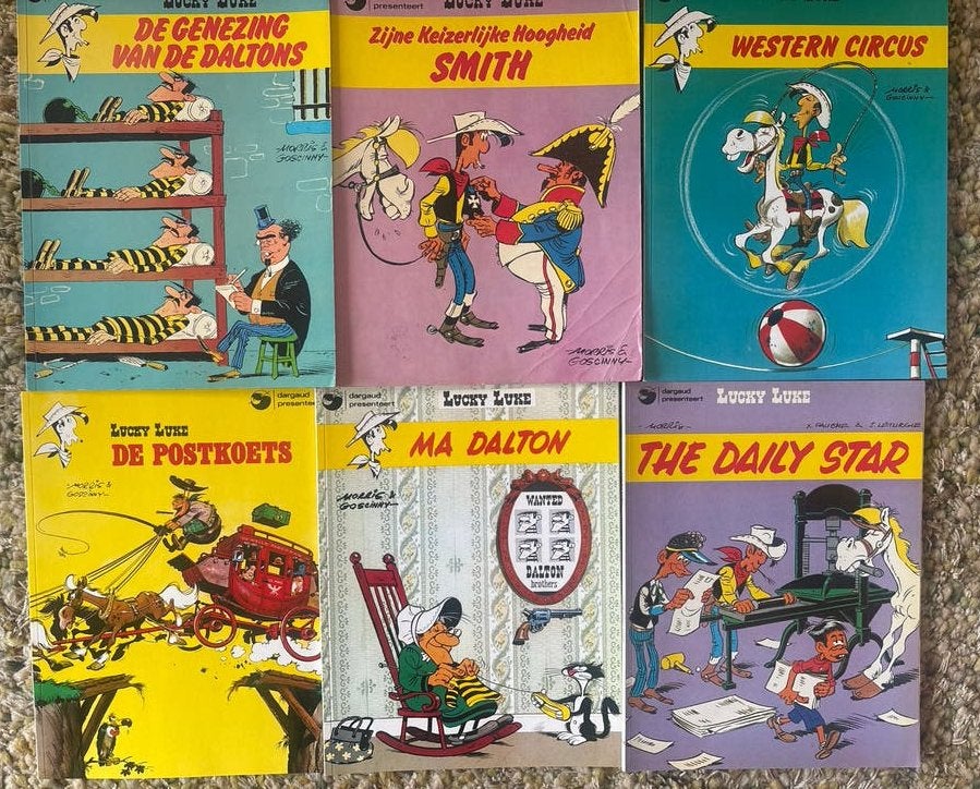Lucky Luke stripboeken - 7 delen, Meerdere stripboeken, Ophalen of Verzenden, Gelezen