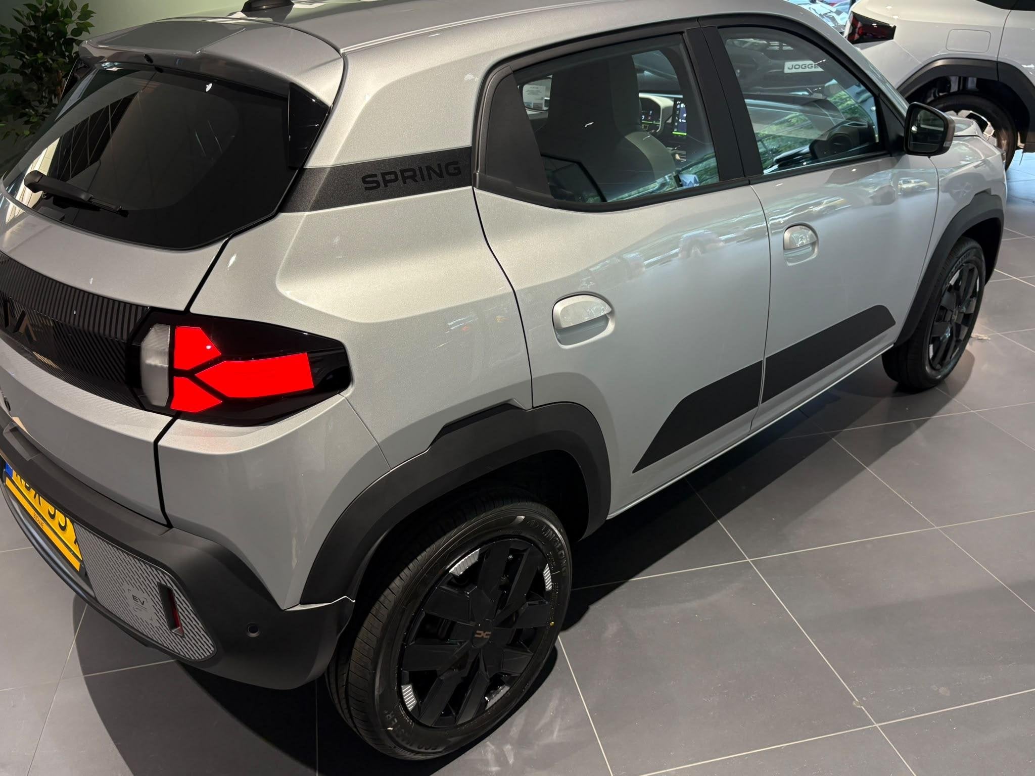 Dacia Spring Expression 70 24.3 kWh | Demo | Camera | Naviga, Auto's, 970 kg, Stof, Gebruikt, Huisgarantie