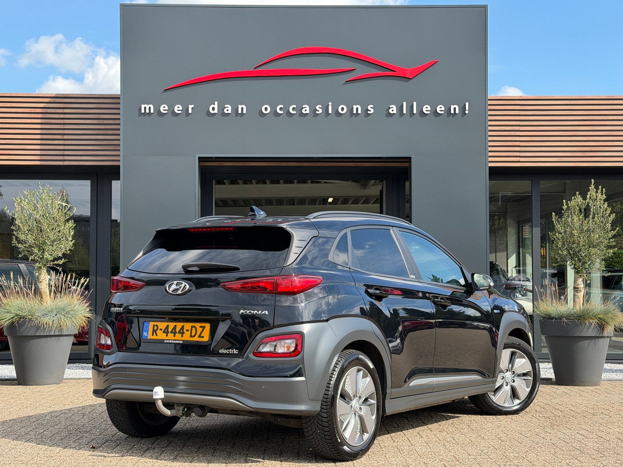 Hyundai KONA Electric 64kWh Premium 3-Fase | Head Up, Auto's, Gebruikt, Zwart, 420 min, 77 €/maand