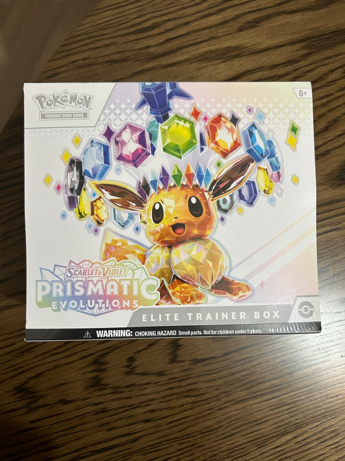 Pokémon Prismatic Evolutions ETB, Ophalen of Verzenden, Nieuw, Overige typen