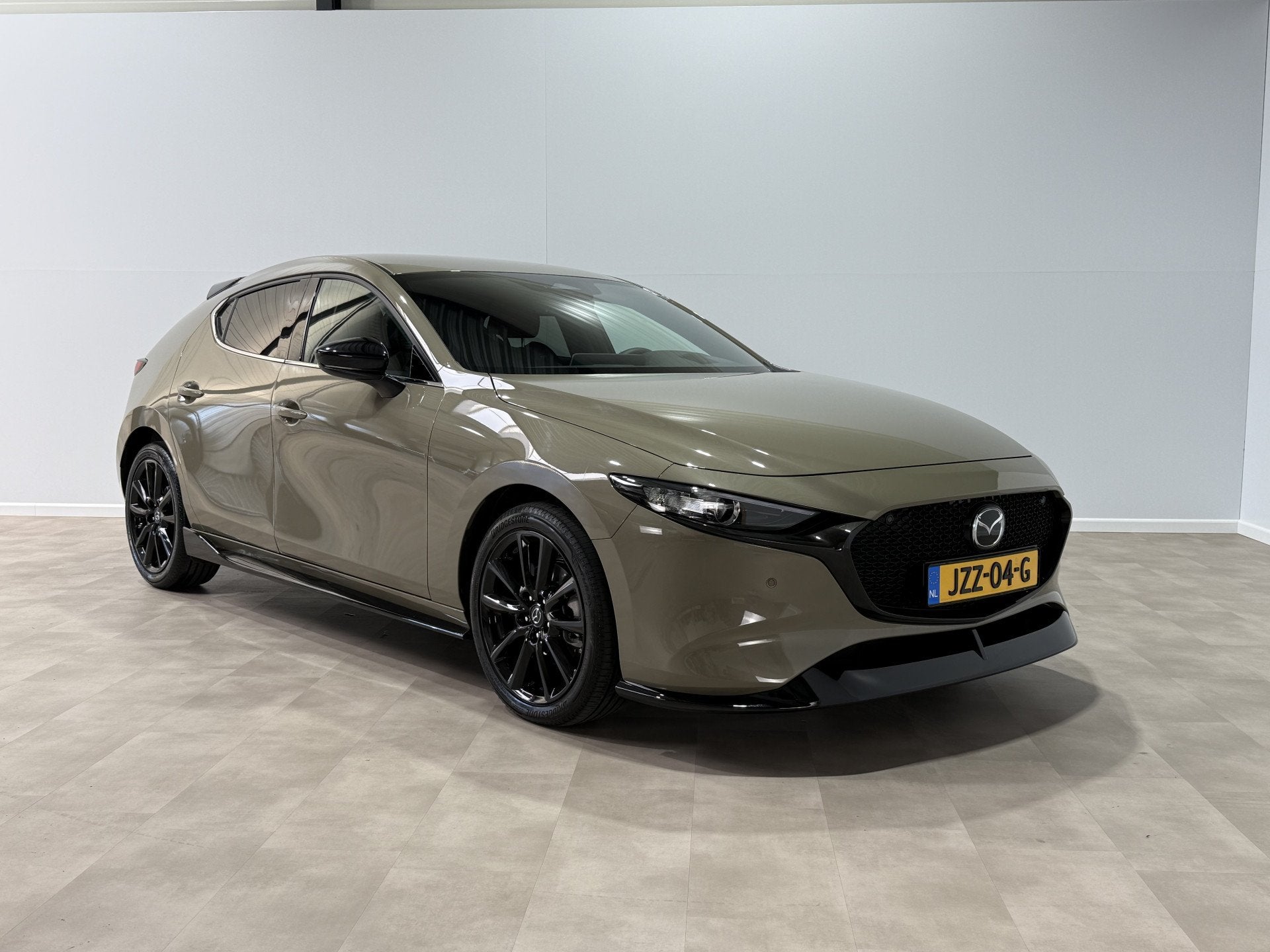 Mazda 3 2.0 e-SkyActiv-X M Hybrid 186 Nagisa Aero Pakket, Auto's, Euro 6, Automatische klimaatregeling, Leder en Stof, Onderhoudsboekje