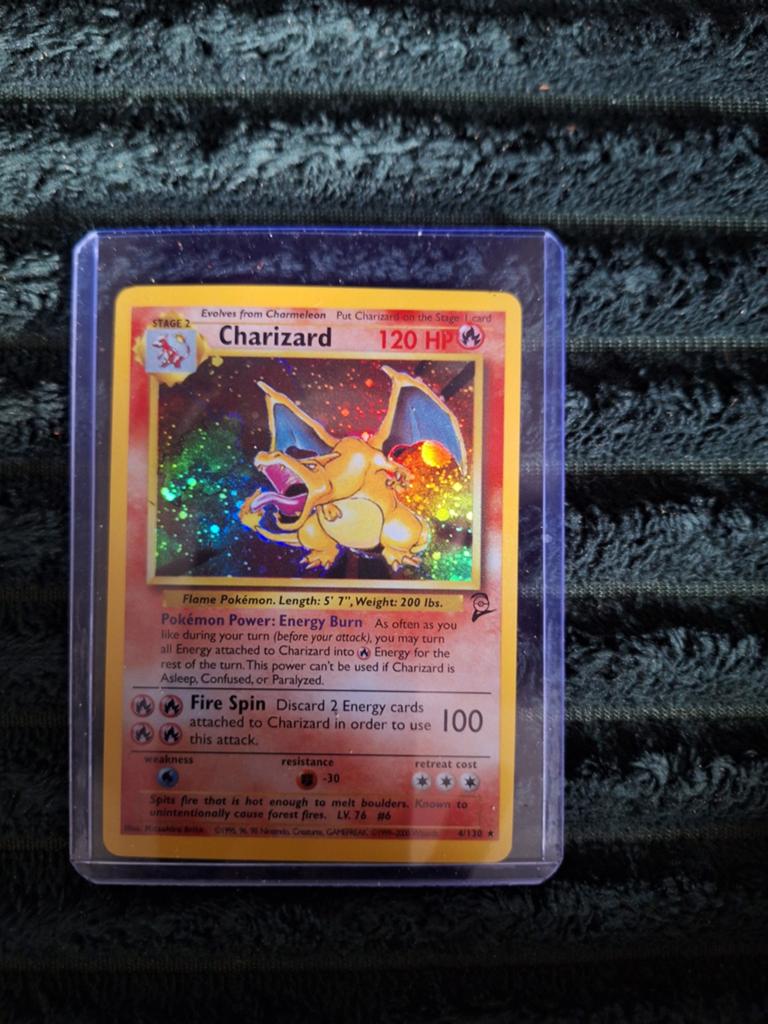 Pokémon Charizard Kaart - Base Set 4/130, Ophalen of Verzenden, Gebruikt, Losse kaart