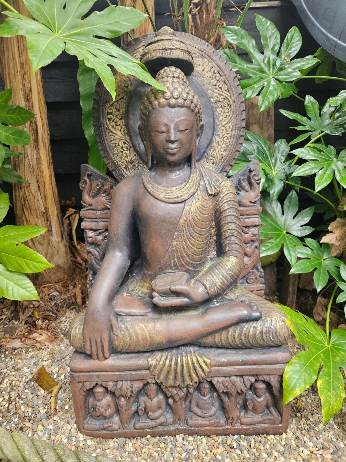 Boeddha voor in de tuin, Ophalen