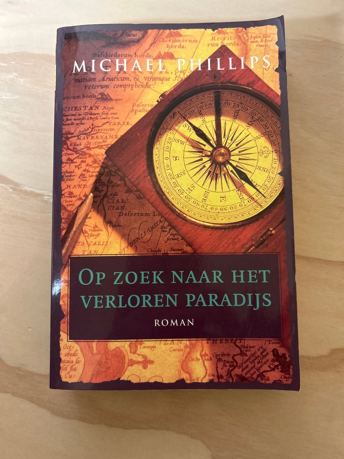 Op Zoek Naar Het Verloren Paradijs - Michael Phillips, Boeken, Romans, Zo goed als nieuw, Nederland, Ophalen of Verzenden