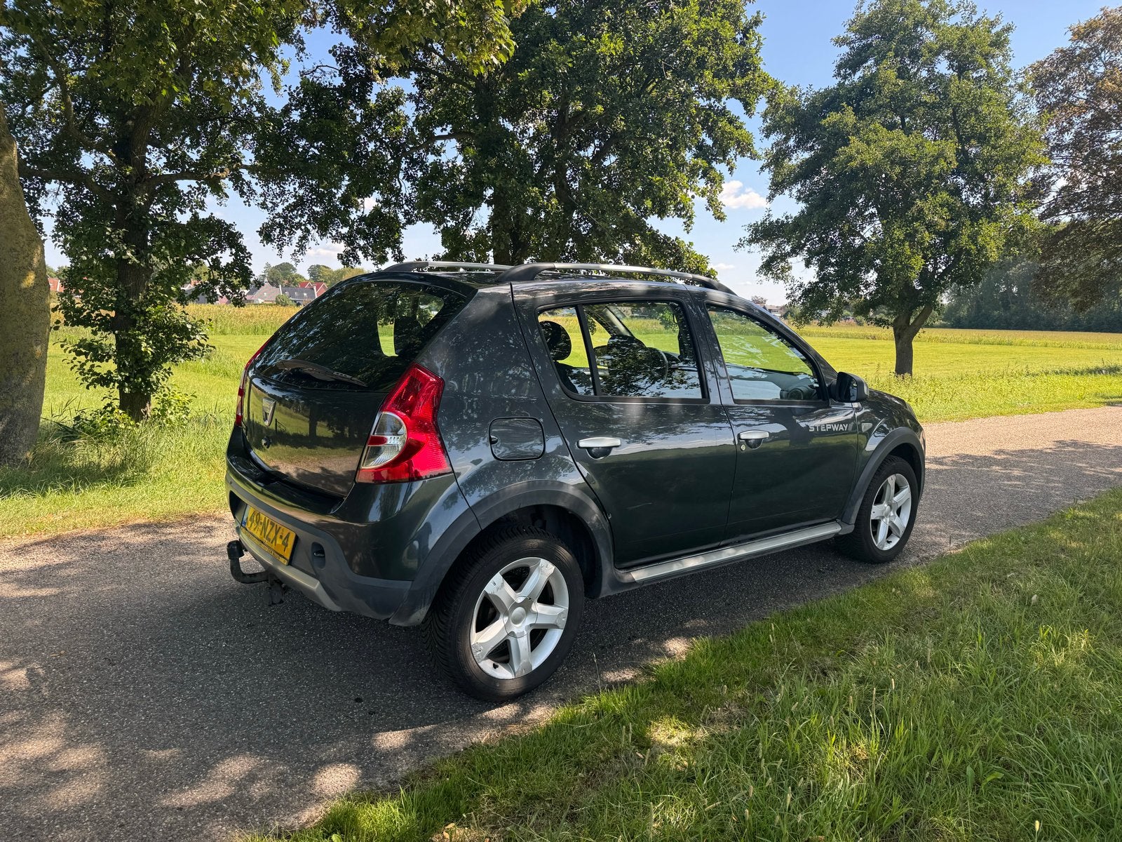 Dacia Sandero 1.6 MPI 90 Stepway 2011 Grijs, 40 €/maand, 4 cilinders, 1070 kg, Origineel Nederlands