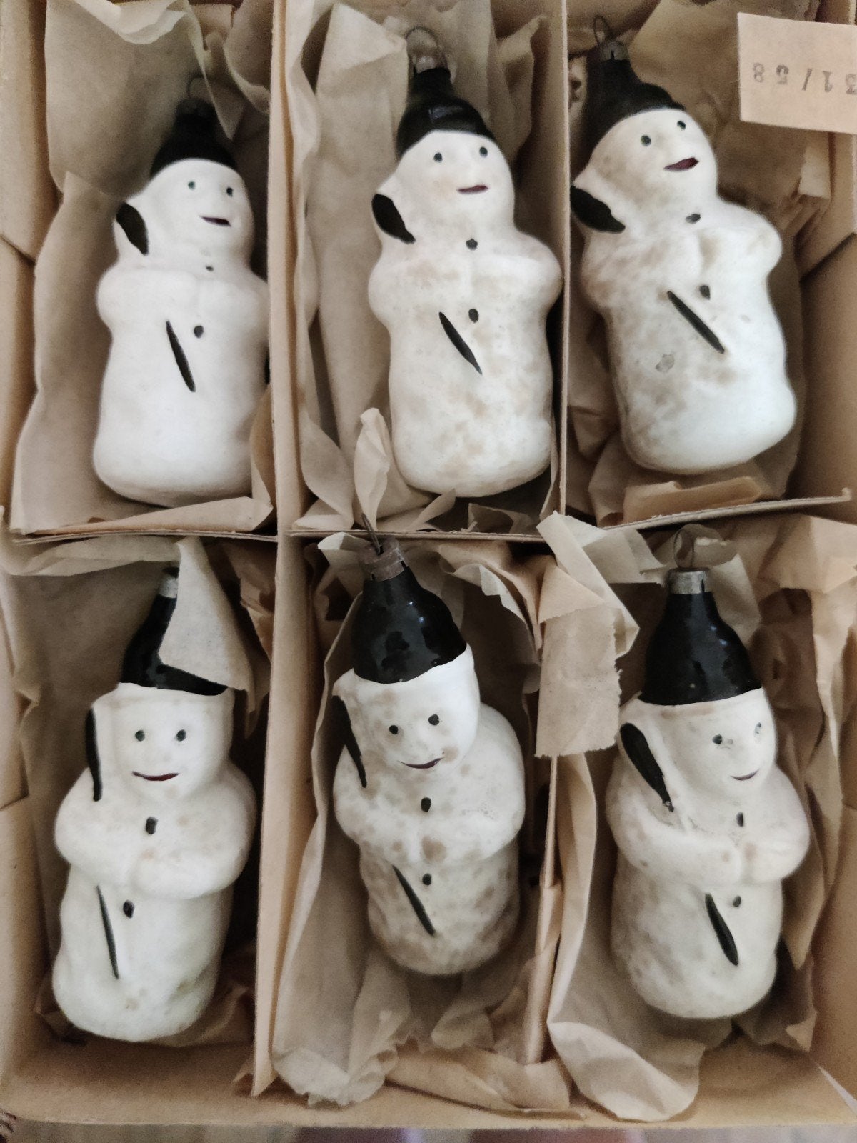 Oude sneeuwmannetjes, Ophalen