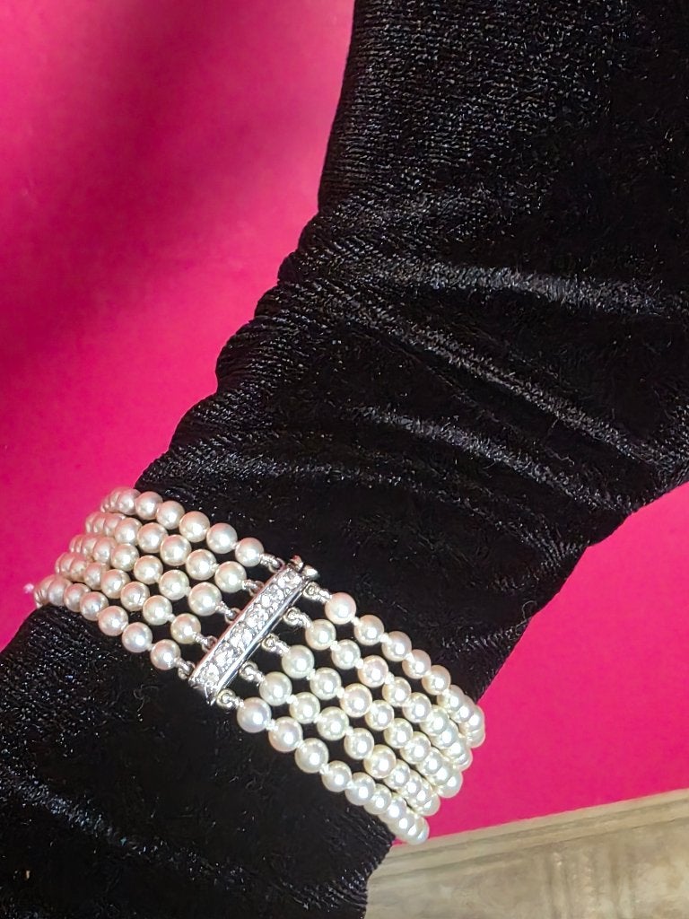 Parels armband met gouden slot en diamanten 0,66kt, Ophalen of Verzenden, Zo goed als nieuw, Met edelsteen, Goud