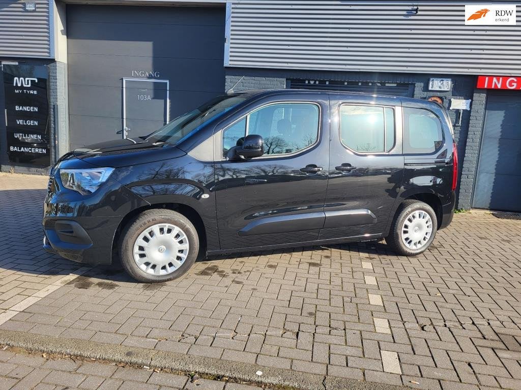 Opel Combo Tour 1.2 Turbo 7pers . Financieren € 238,00 p.m, Auto's, Opel, Voorwielaandrijving, Gebruikt, Euro 6, 7 stoelen