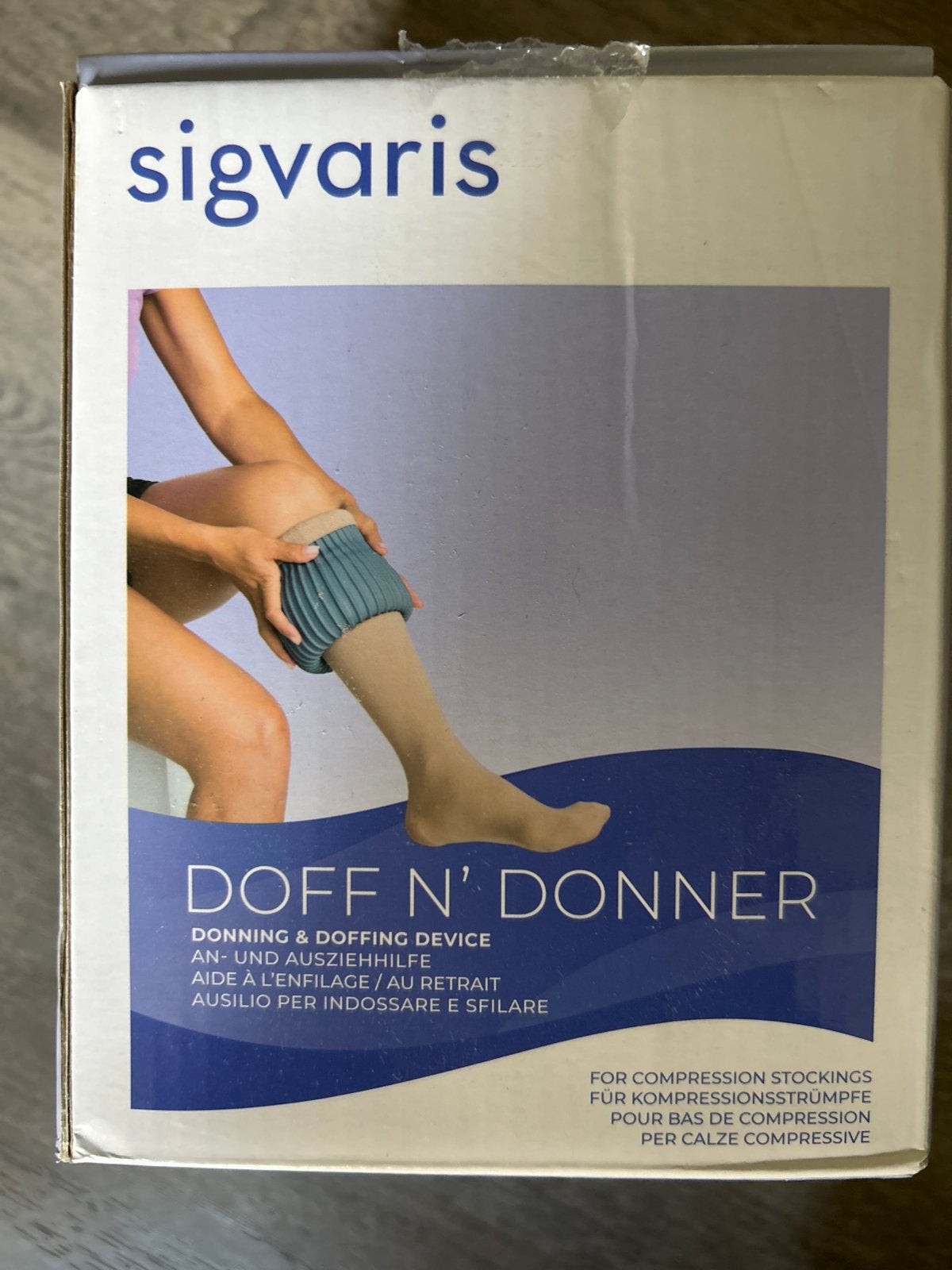 DOFF N’ DONNER aan en uittrekhulp, Ophalen, Zo goed als nieuw
