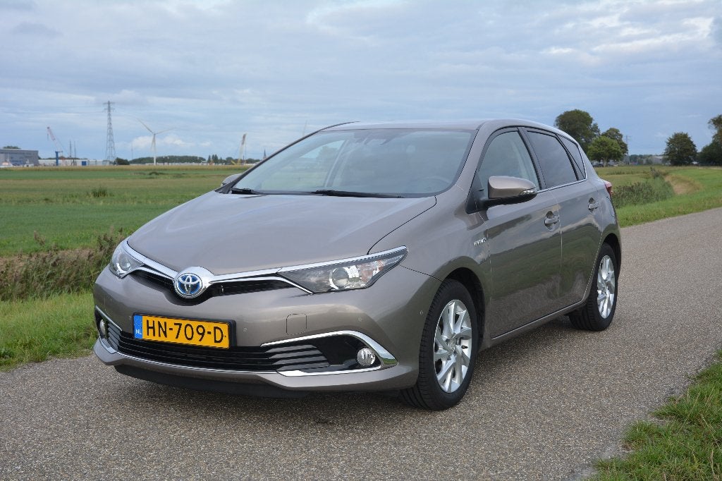 Toyota Auris 1.8 Hybrid 5DR CVT 2015 Bruin Executive, Auto's, Dealer onderhouden, Zwart, Bruin, Leder en Stof