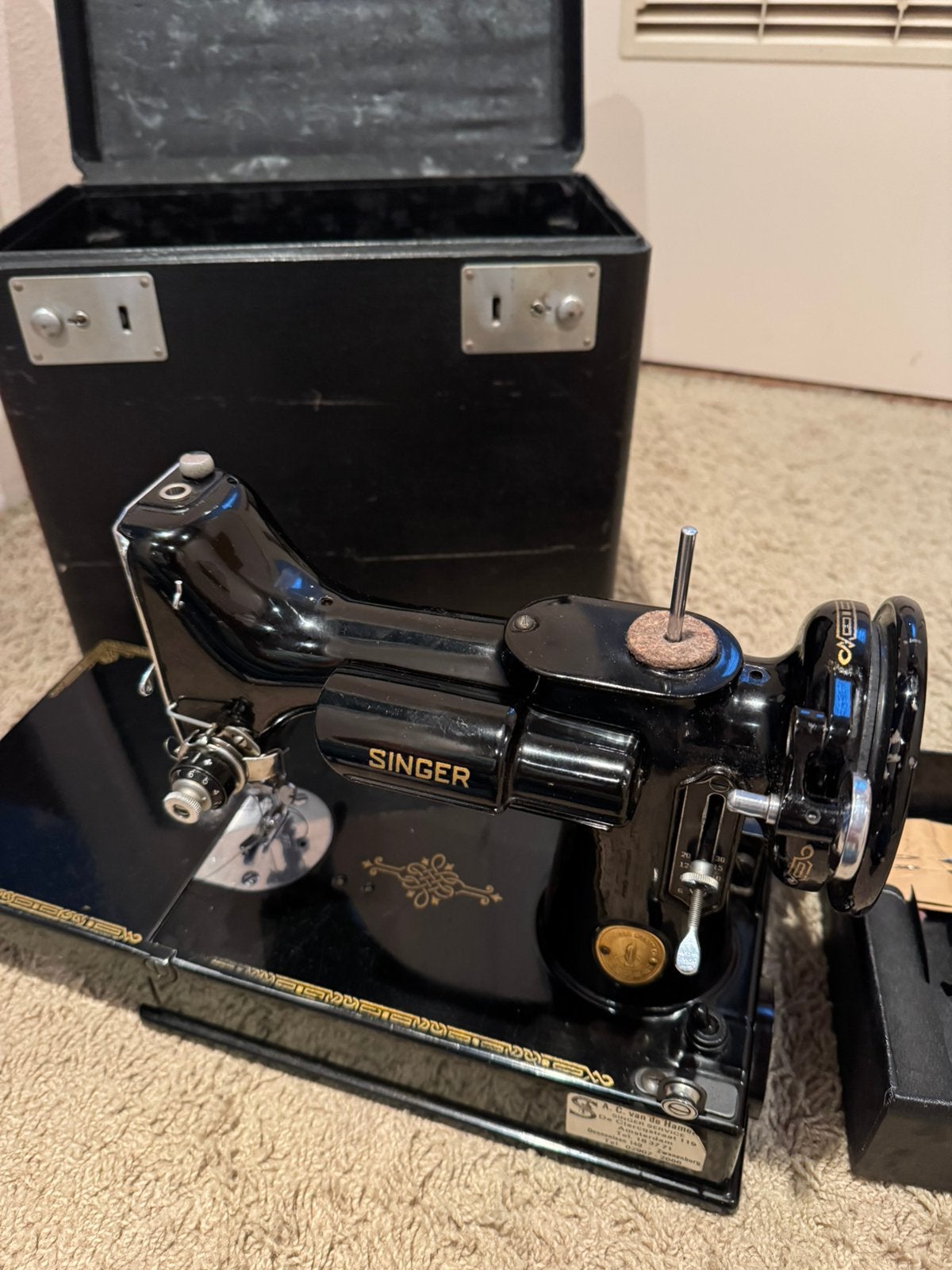 Singer 221K Featherweight Naaimachine, Ophalen