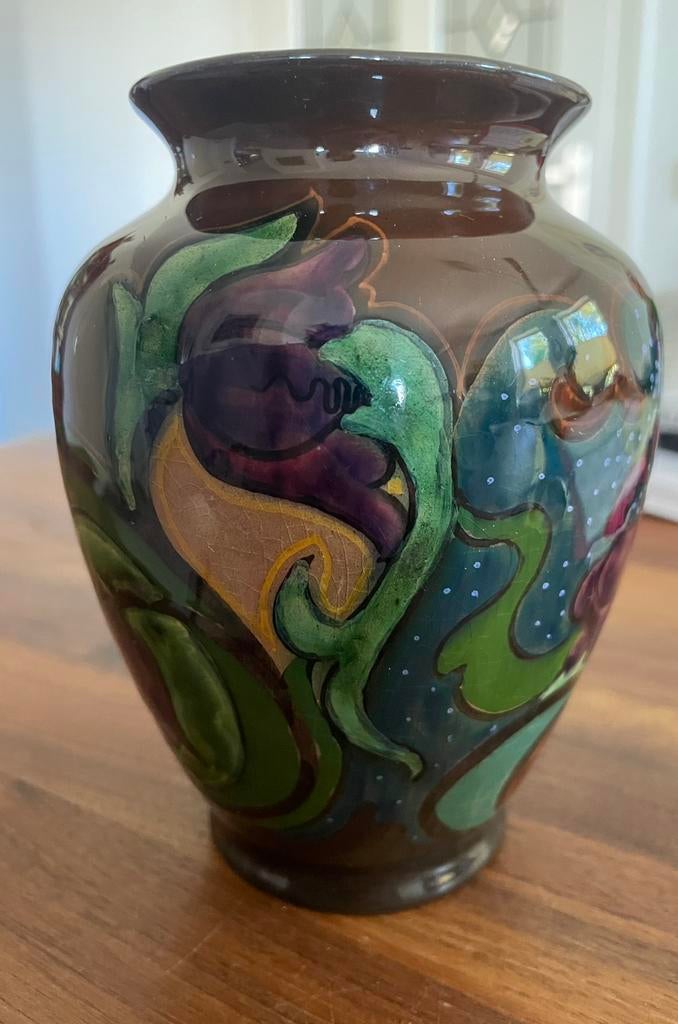 Gouds plateel vaasje, Ophalen