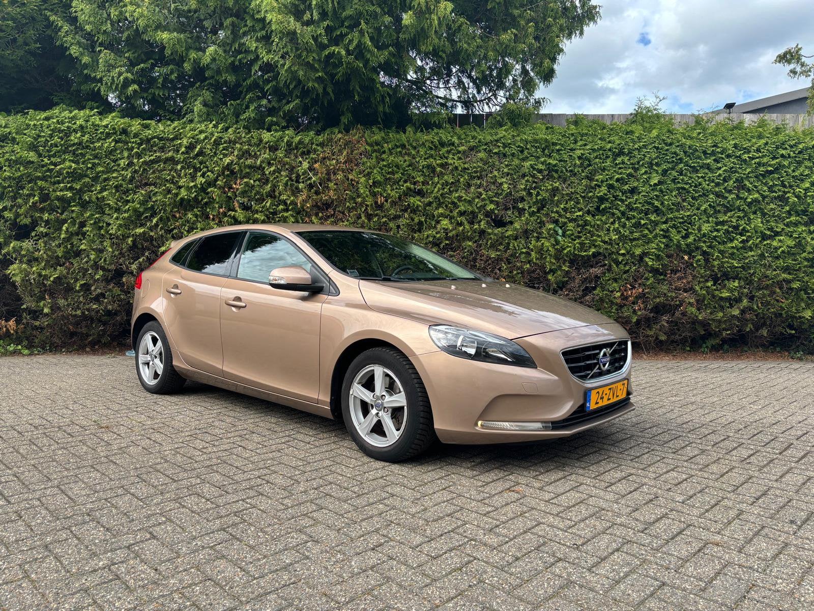 Volvo V40 1.6 T4 180PK | Clima | Navi | Camera |, Auto's, Voorwielaandrijving, 1596 cc, 4 cilinders, Bruin