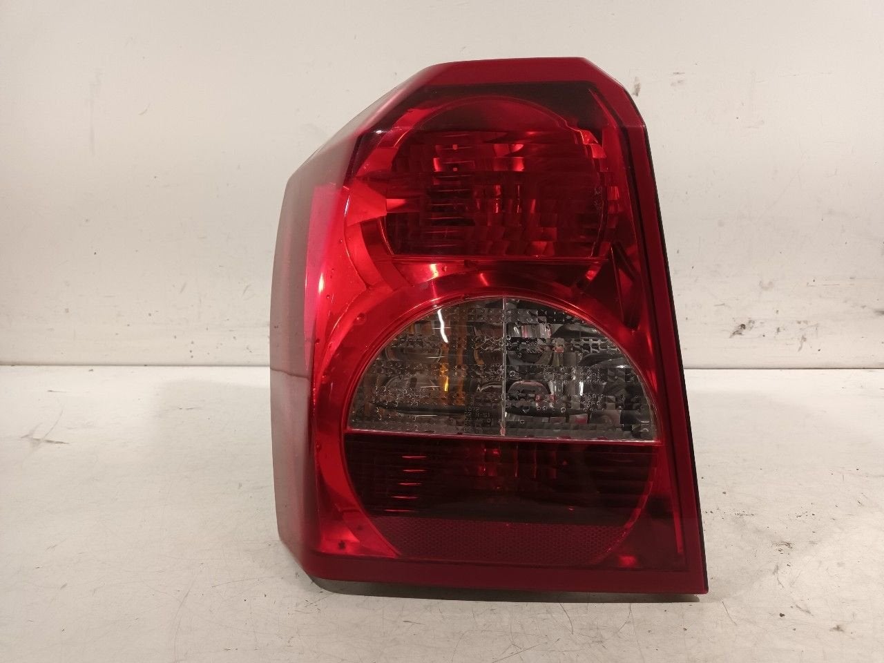 Achterlicht links buiten Dodge Caliber, Auto-onderdelen, Verlichting, Onderdelen@venauto.nl, Van der Ven Autorecycling B.V., Gebruikt