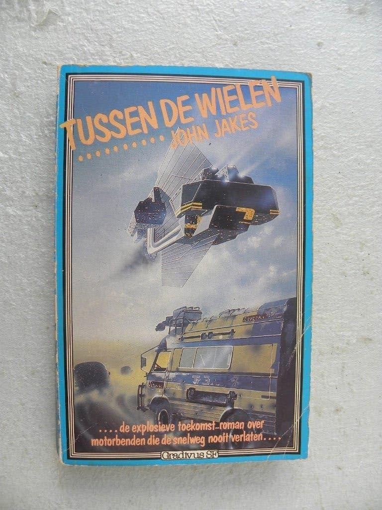 Tussen de wielen, John Jakes, Ophalen of Verzenden, Gelezen