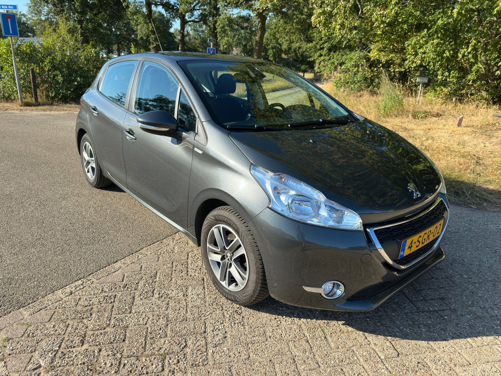 Peugeot 208 1.2 VTI 60KW/82PK 5-D 2013 Grijs, Auto's, Voorwielaandrijving, Stof, 31 €/maand, 1199 cc