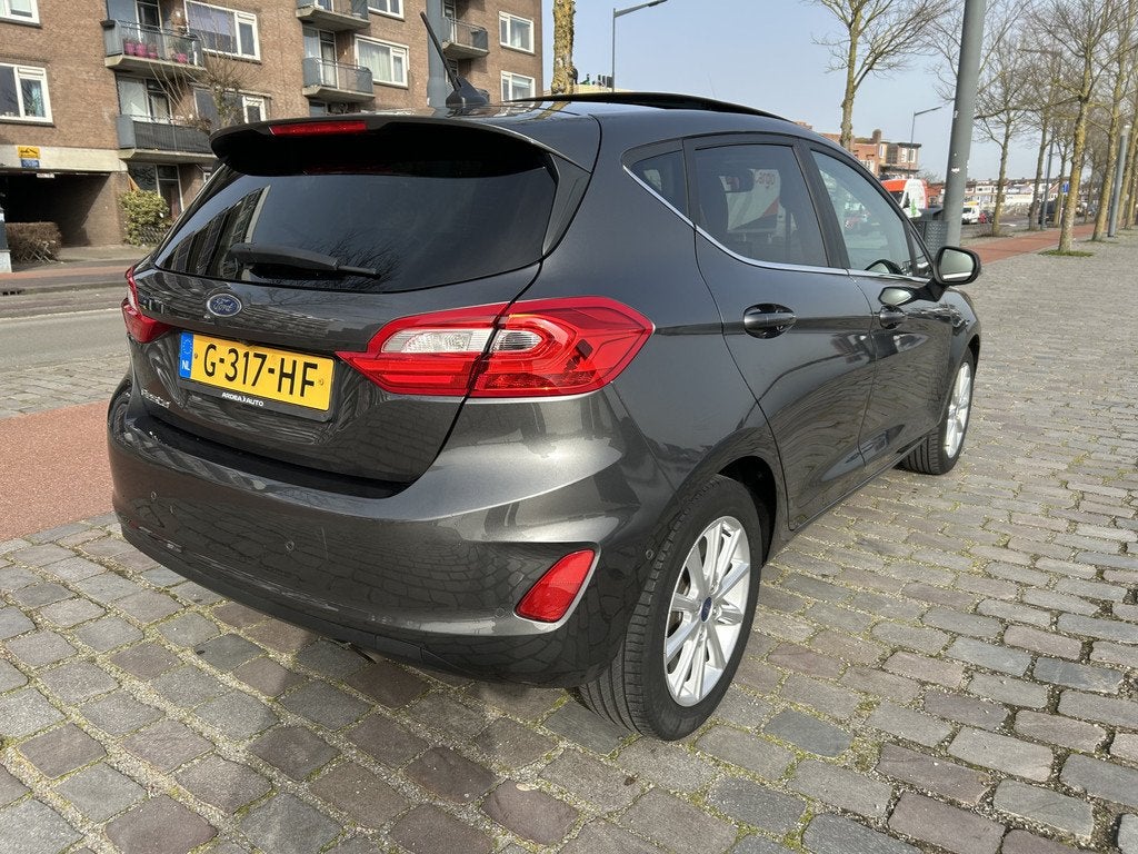 Ford Fiesta 1.0 EcoBoost Titanium automaat panoramadak airco, Gebruikt, 1144 kg, 49 €/maand, Origineel Nederlands