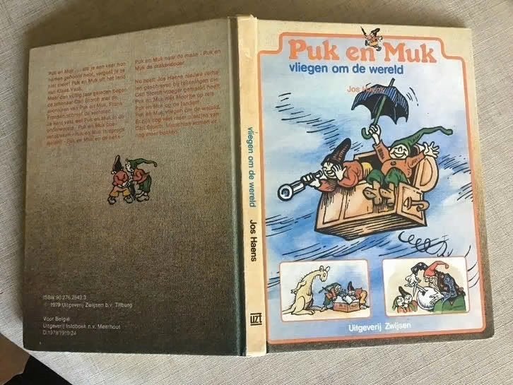 Puk en Muk vliegen om de wereld door Carl Storch, Ophalen of Verzenden, Gelezen, Sprookjes