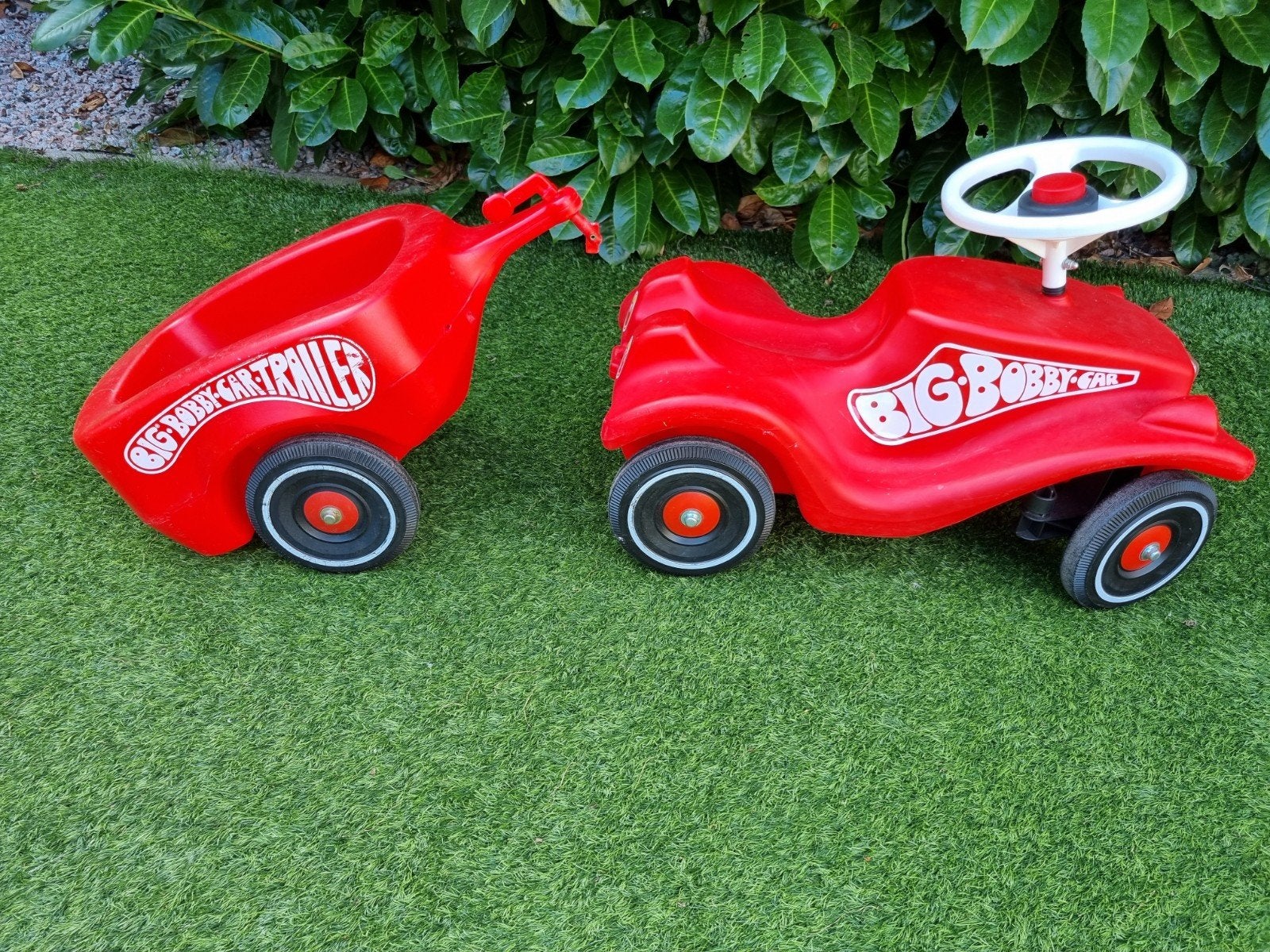 Nette loopauto met aanhanger