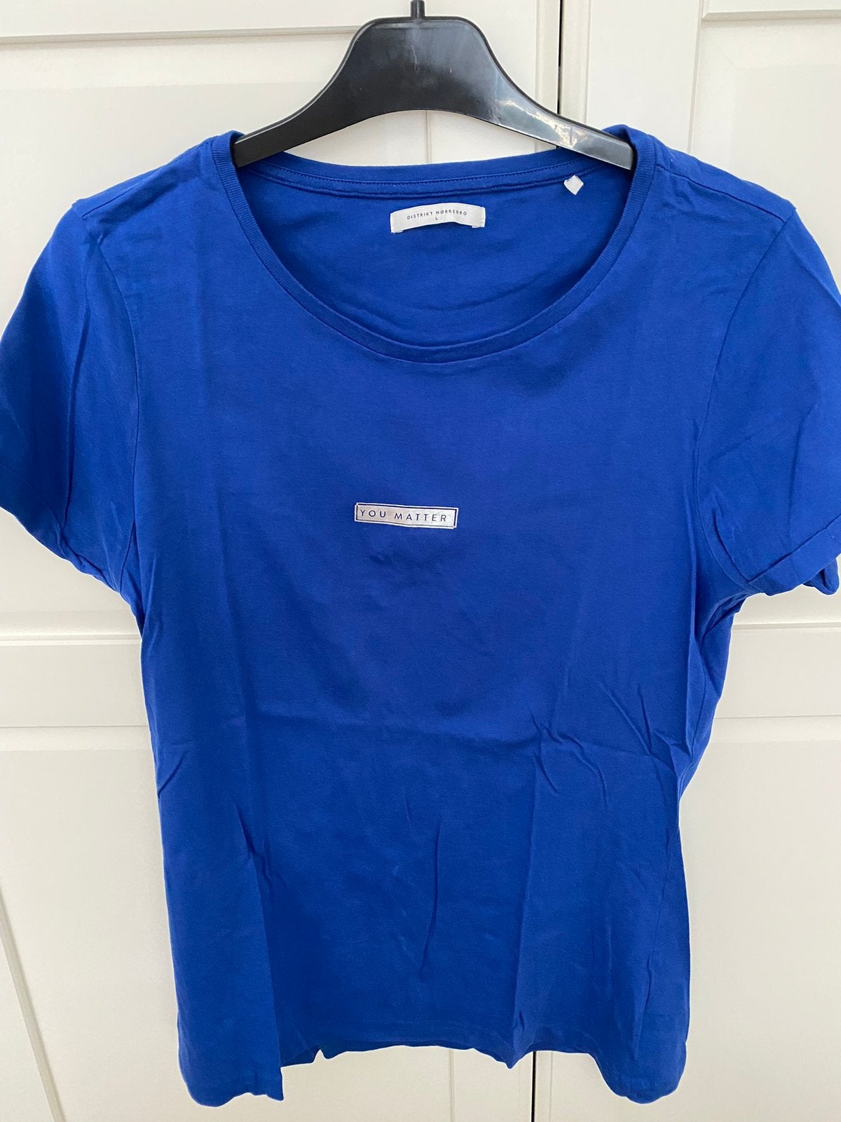 Blauw t shirt Distrikt Norrebro, Kleding | Dames, Blauw, Maat 42/44 (L), Ophalen of Verzenden, Zo goed als nieuw