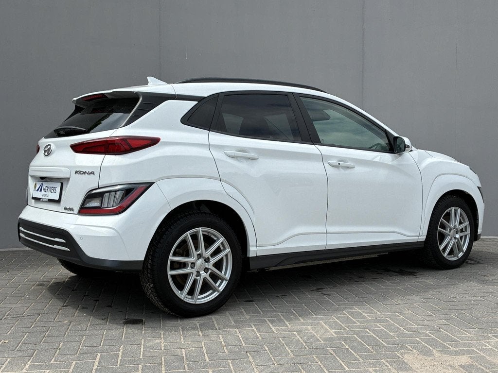 Hyundai Kona EV Fashion 64 kWh / €19.985,- ex btw / Grijs, Auto's, Hyundai, Stof, Gebruikt, Wit, 410 min