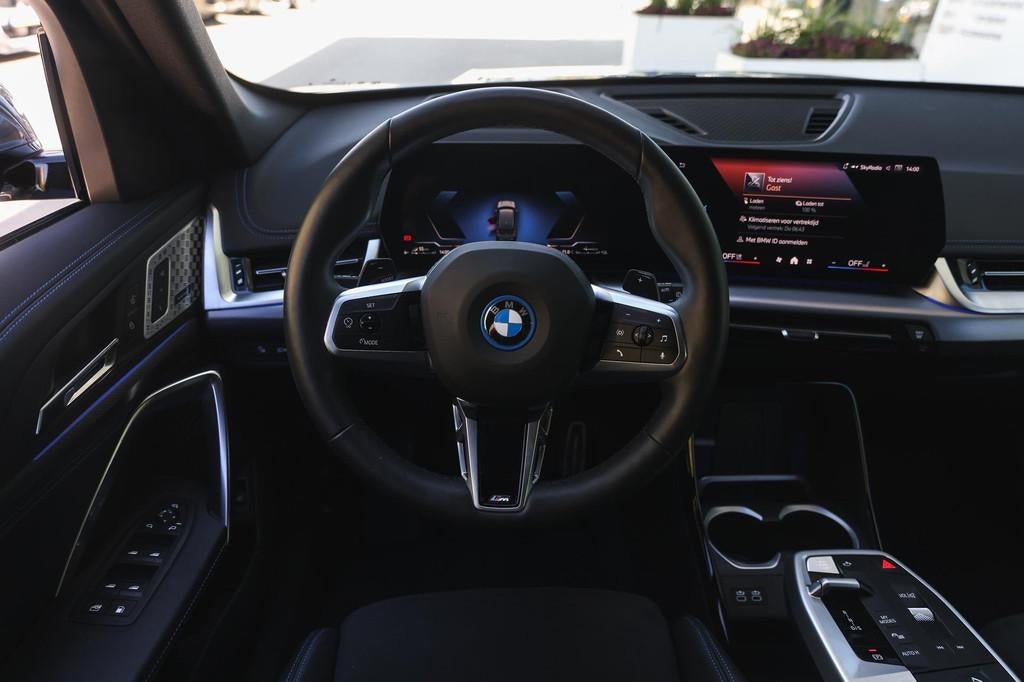 BMW X1 xDrive25e M Sport Automaat / Trekhaak / Sportstoelen, Gebruikt, Bedrijf, Hybride Elektrisch/Benzine, 3 cilinders