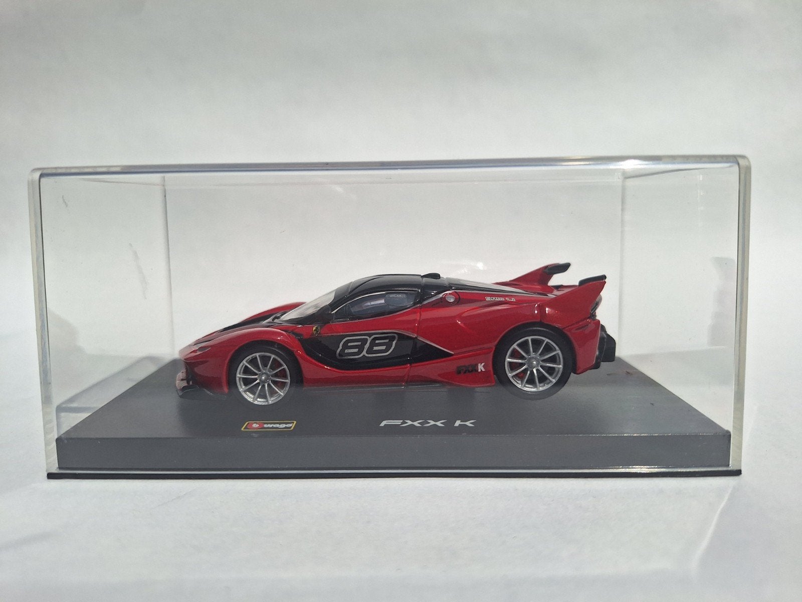 Ferrari FXX K - rood/zwart - Burago, Ophalen of Verzenden, Zo goed als nieuw, Auto, Overige merken